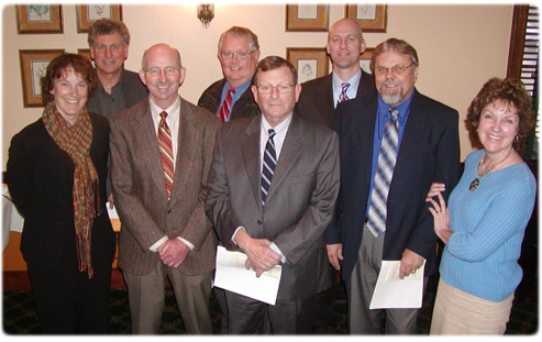 Keary Bilka, Manitowoc County Bar president; Reserve Judge Donald Poppy; and Jeffrey Dunn, Manitowoc County Bar secretary/treasurer. Front row, from left: Judge Lisa Neubauer, District II Court of Appeals; Manitowoc County Circuit Court judges Patrick L. Willis, Jerome L. Fox, and Gary L. Bendix; and Mrs. Jean Willis.