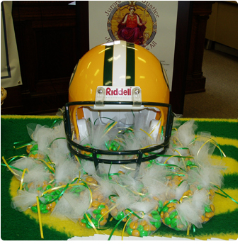 Forest County Clerk of Court Penny Carter included a Green Bay Packers helmet among decorations featured during a juror appreciation event at the Forest County Courthouse. Among the more elaborate of celebrations statewide, Carter provided jurors, past and present, with cake, candy, soda and coffee. Wisconsin Supreme Court Chief Justice Shirley S. Abrahamson also visited with jurors during the event.