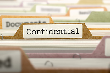 file folder labeled Confidential