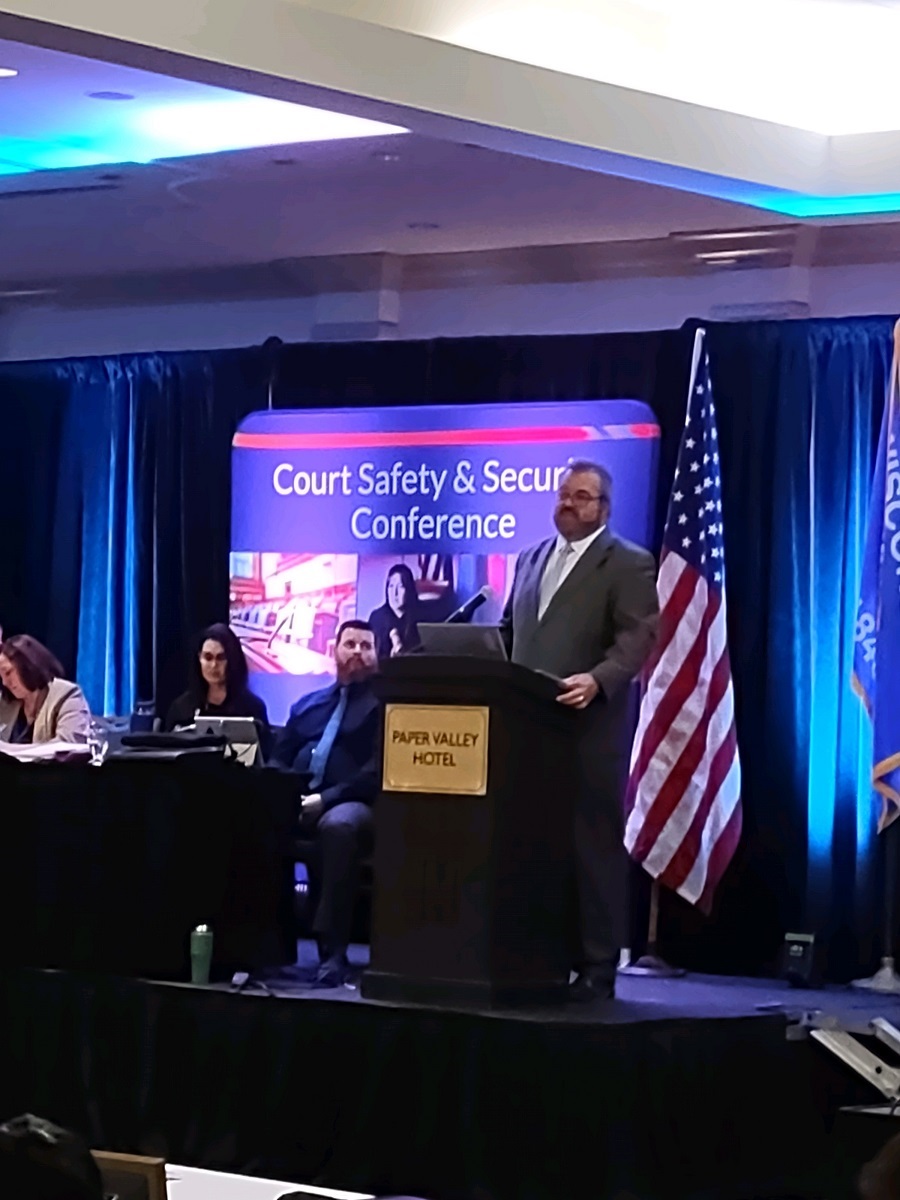 Director of State Courts Randy R. Koschnick makes introductory remarks at the 2023 Annual Court Security Conference in Appleton. 
